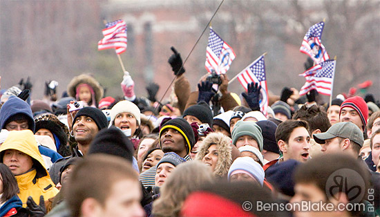 Crowd waving American flags