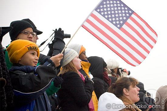 Boy waving American flag